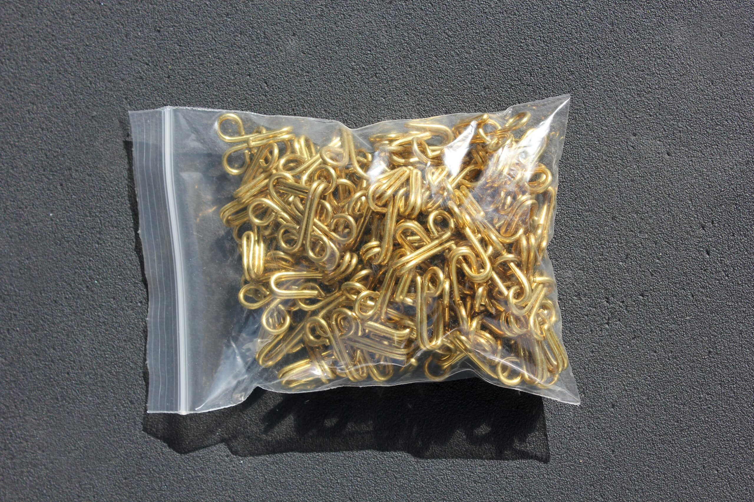 Bag of Brass Hooks